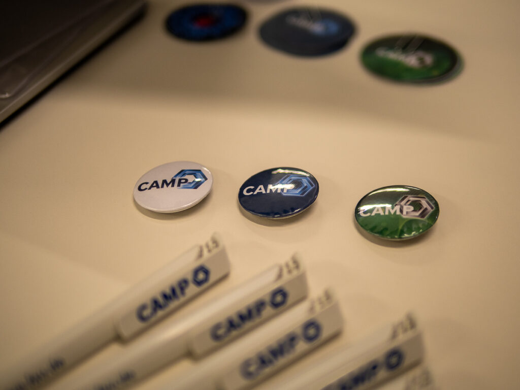 CAMP buttons at the CAMP booth